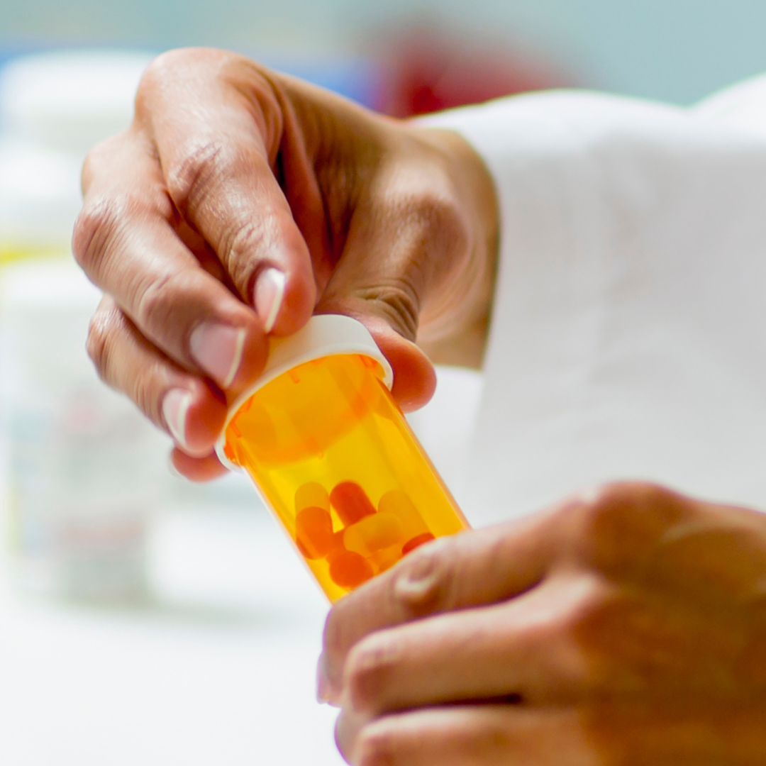 Pharmacist dispensing pills